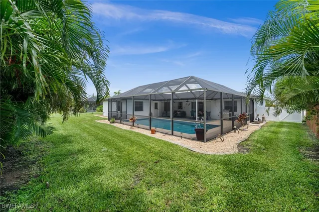 a view of a house with a big yard