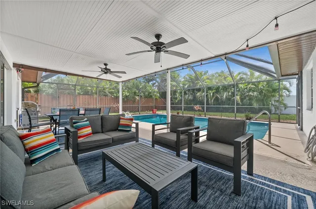 a outdoor living space with furniture and garden view