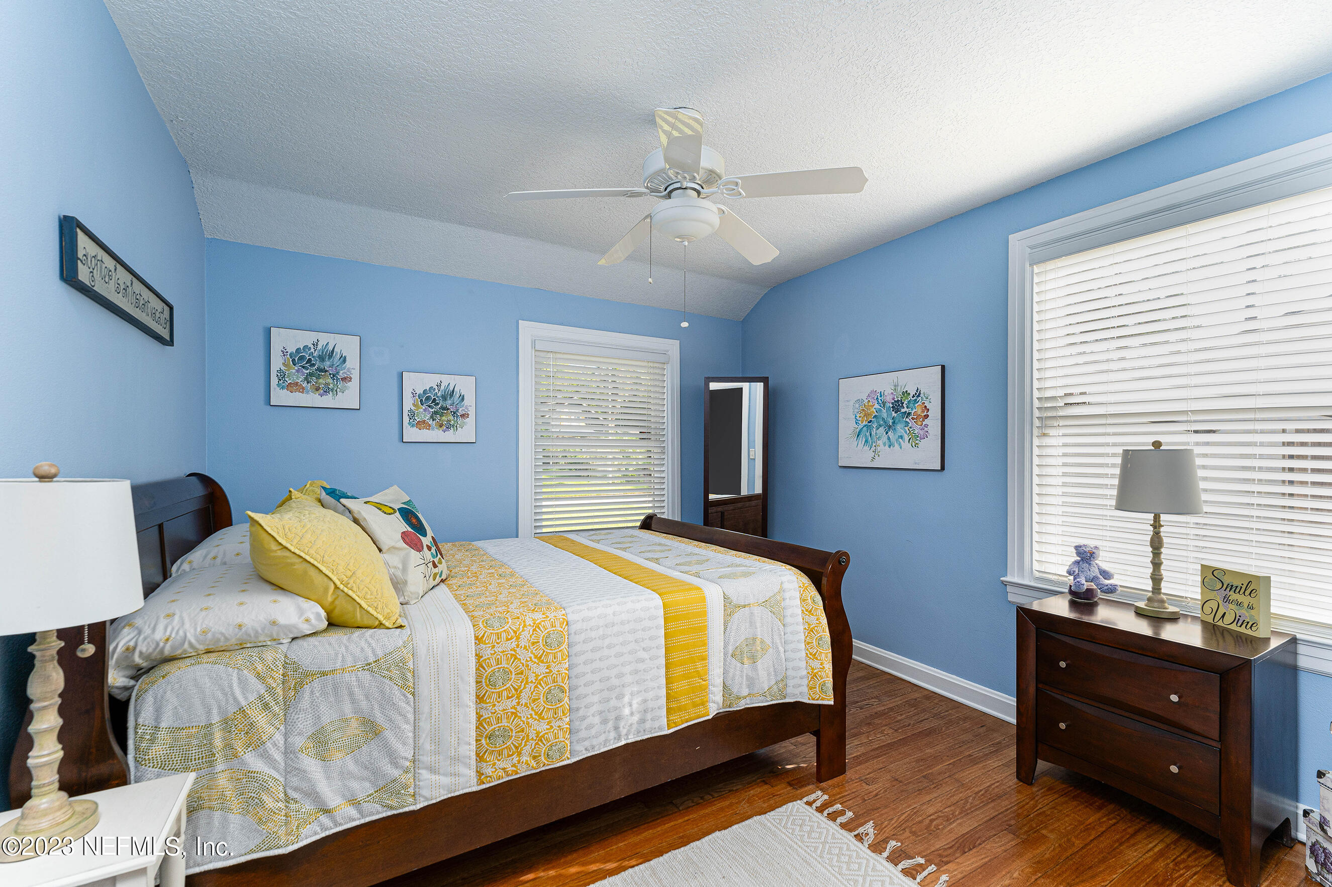 1544 Lorimier Road Jacksonville, FL 32207 - Photo 16 of 27 a bedroom with a bed and a window