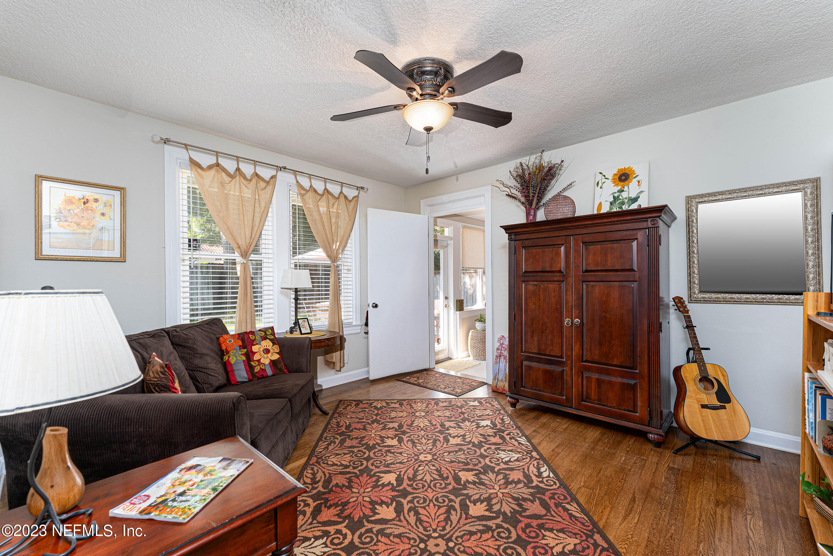 1544 Lorimier Road Jacksonville, FL 32207 - Photo 17 of 27 a living room with furniture and a window