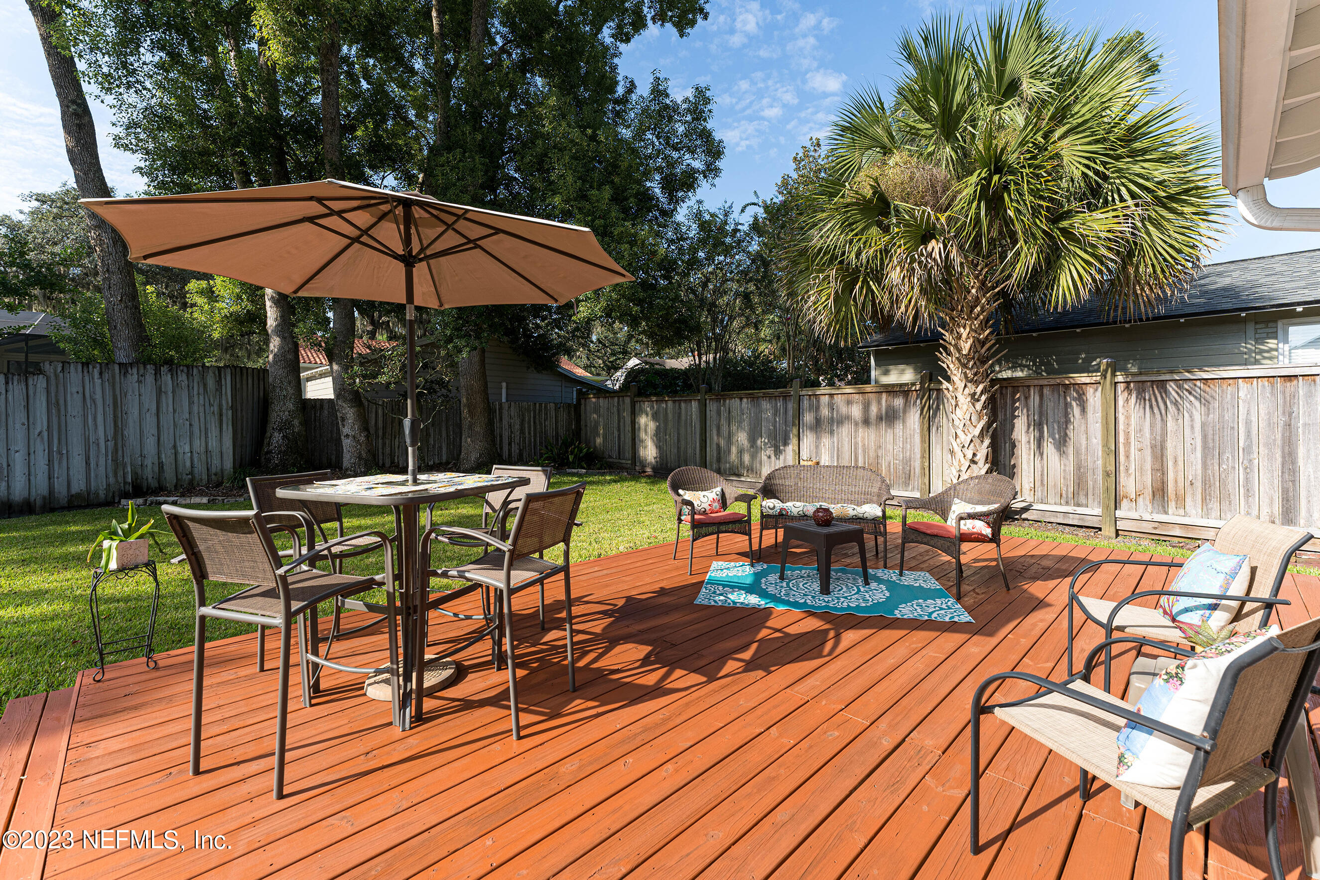 1544 Lorimier Road Jacksonville, FL 32207 - Photo 20 of 27 a view of a chairs and table in the patio
