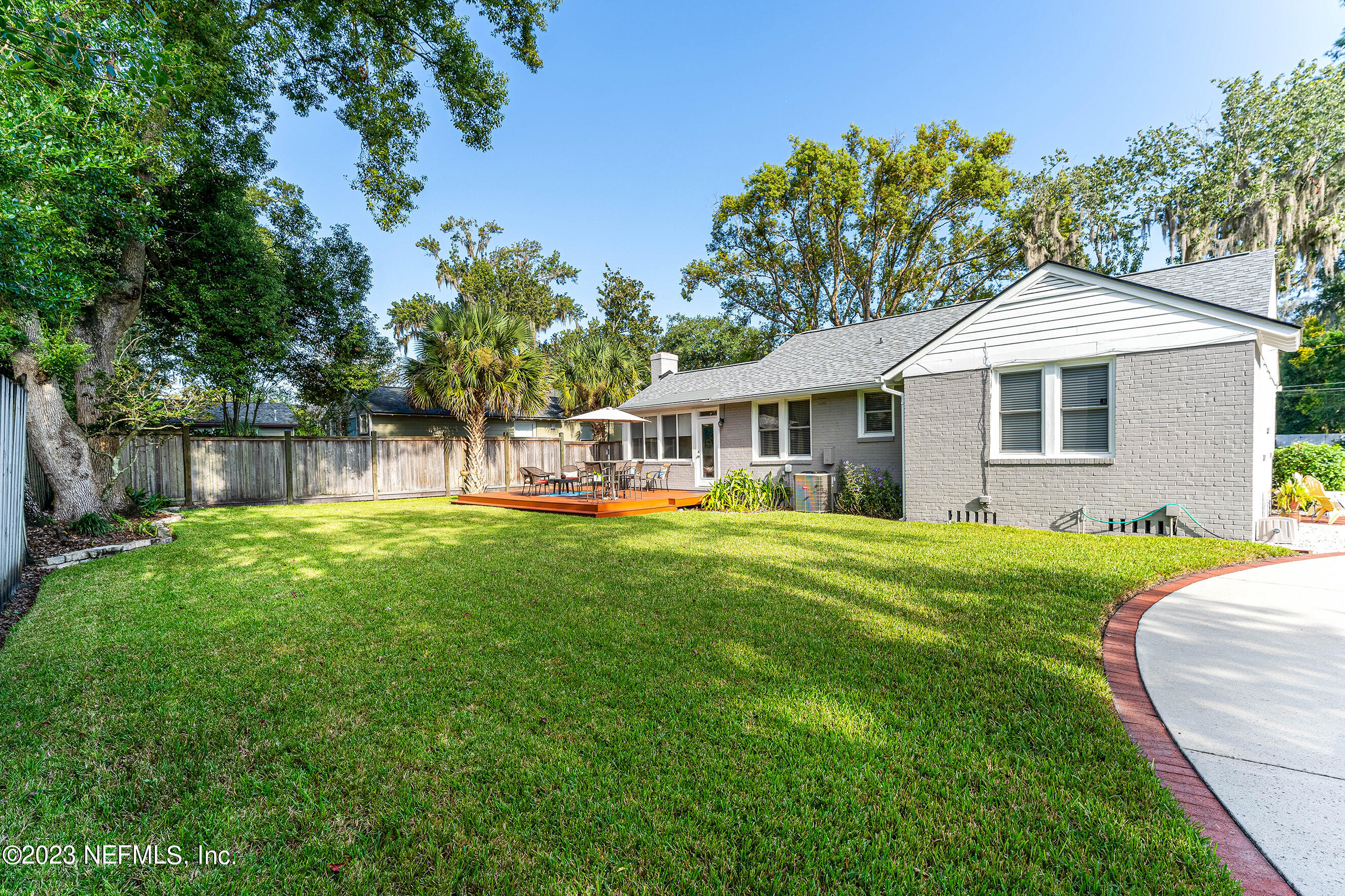 1544 Lorimier Road Jacksonville, FL 32207 - Photo 22 of 27 a front view of a house with a garden