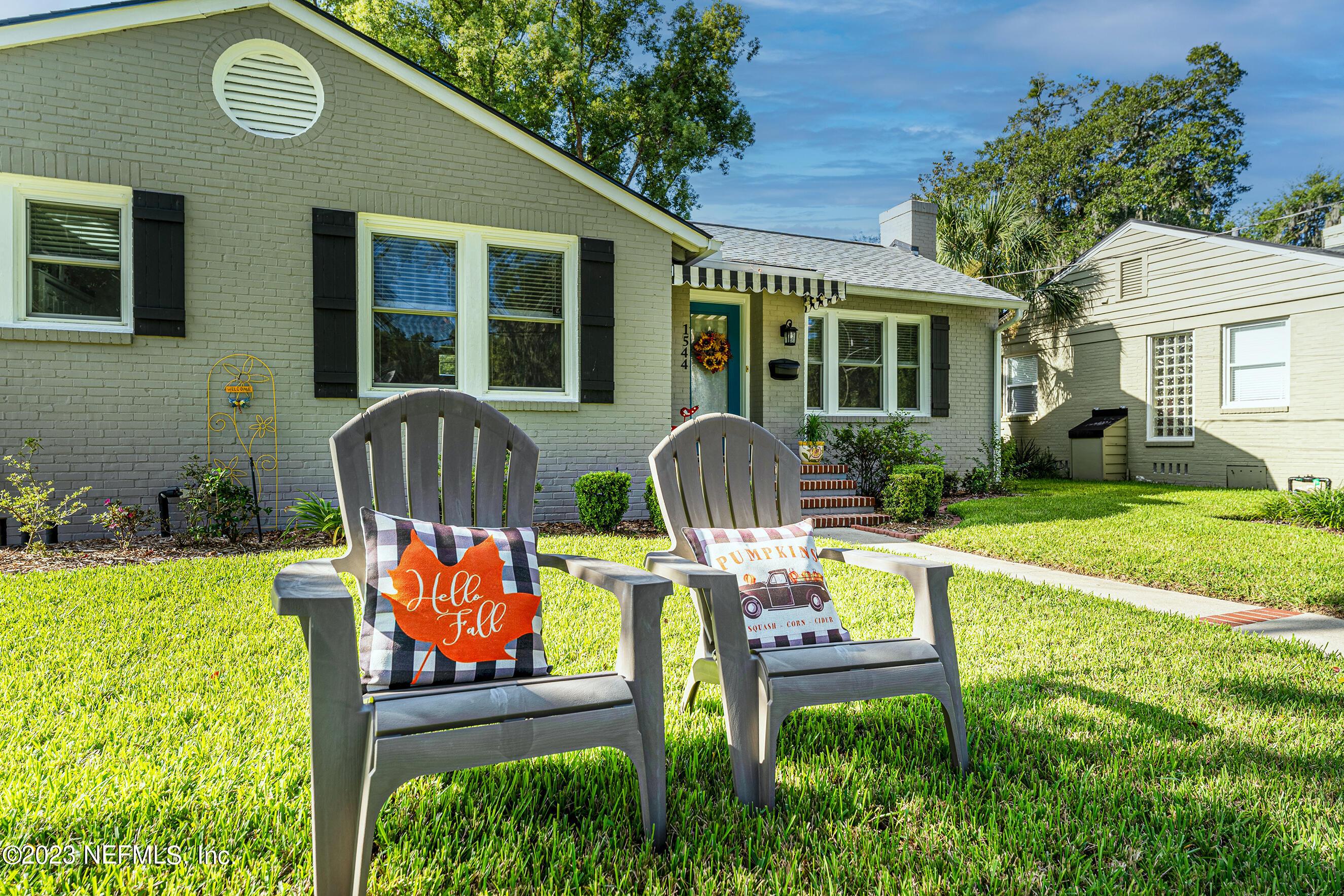 1544 Lorimier Road Jacksonville, FL 32207 - Photo 25 of 27 a front view of house with a garden and patio