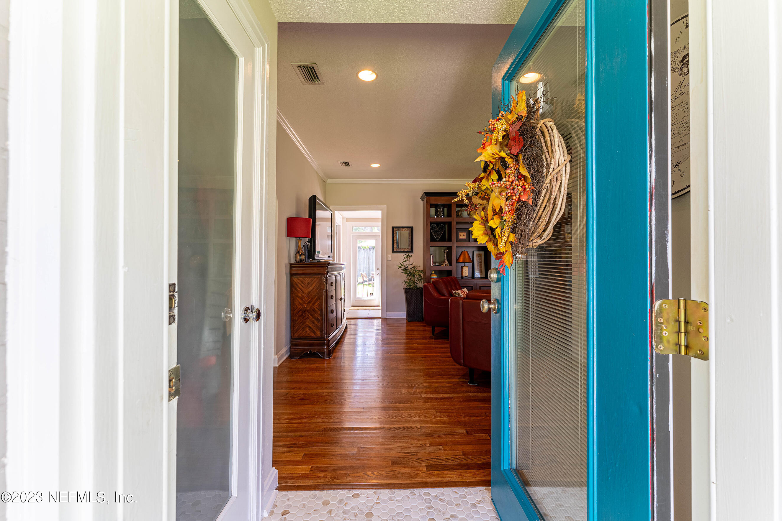 1544 Lorimier Road Jacksonville, FL 32207 - Photo 5 of 27 a view of a hallway with wooden floor