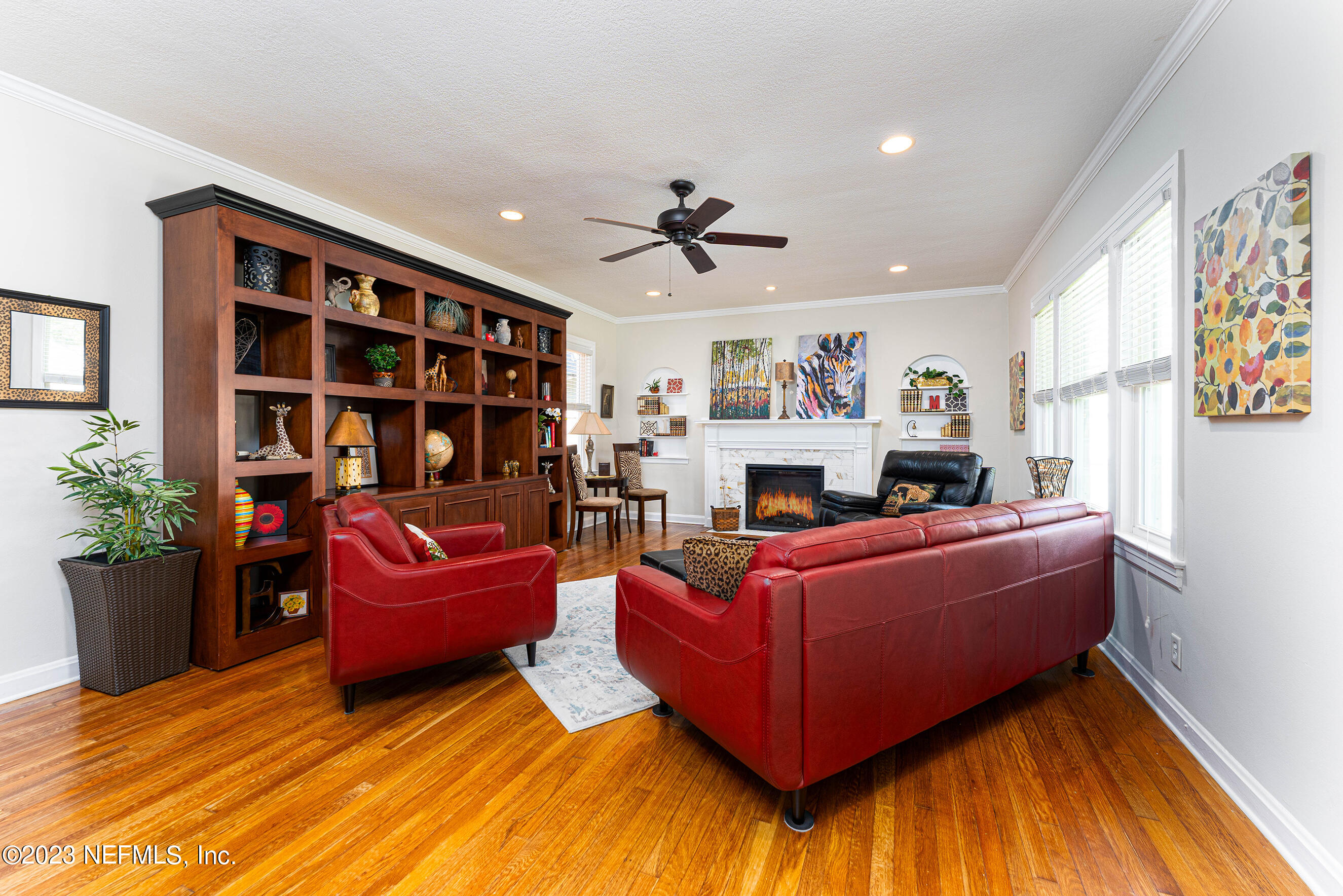 1544 Lorimier Road Jacksonville, FL 32207 - Photo 6 of 27 a living room with furniture and a fireplace