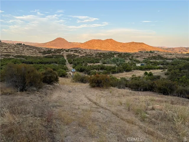 a view of a mountain with an outdoor space