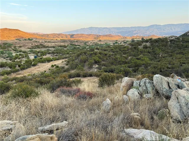 a view of a city with mountains in the background