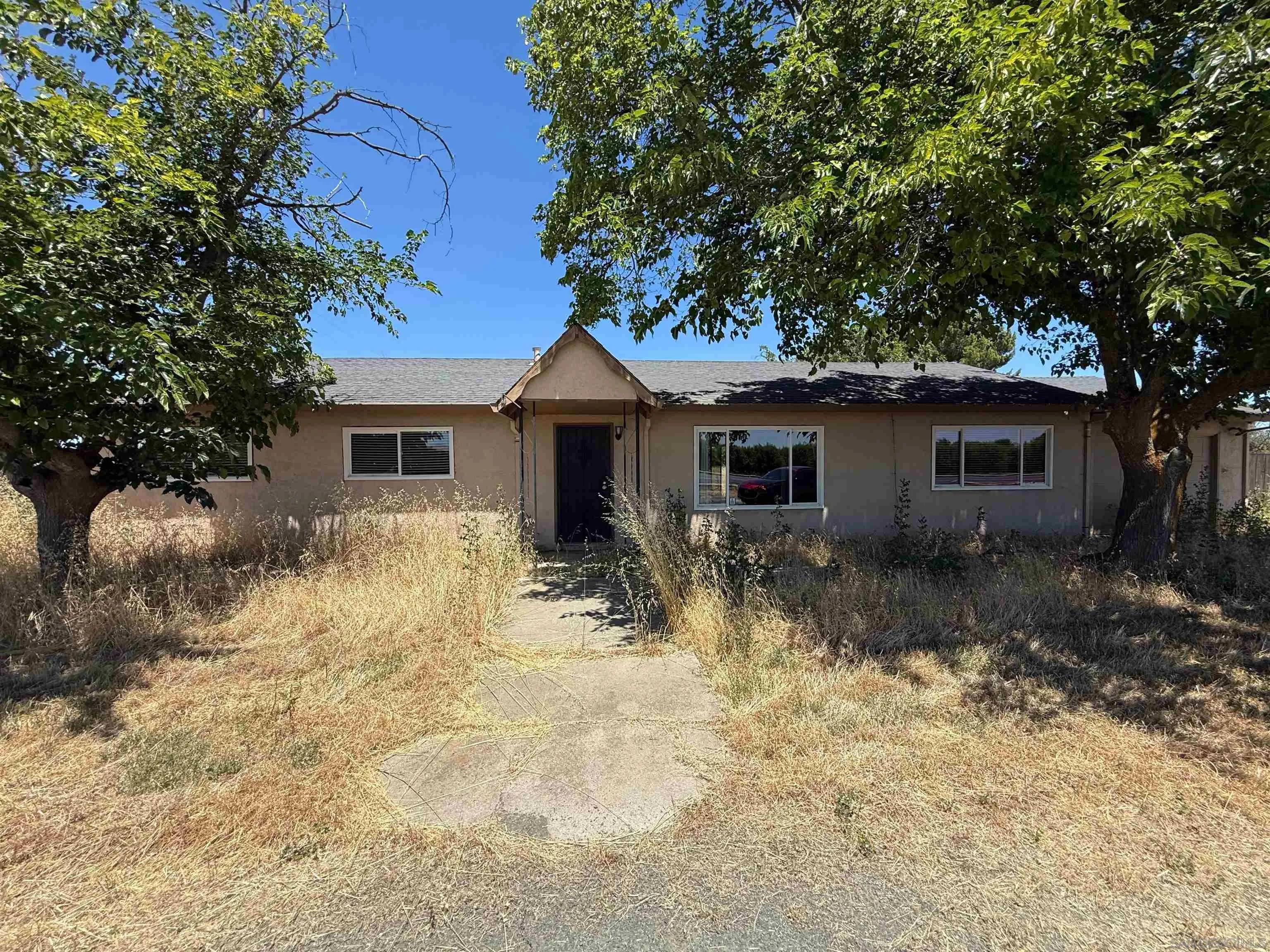 23273 Marsh Creek Road Brentwood, CA 94513 - Photo 1 of 8 a view of a house with a yard