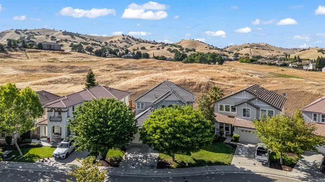 a view of an ocean with a building in the background