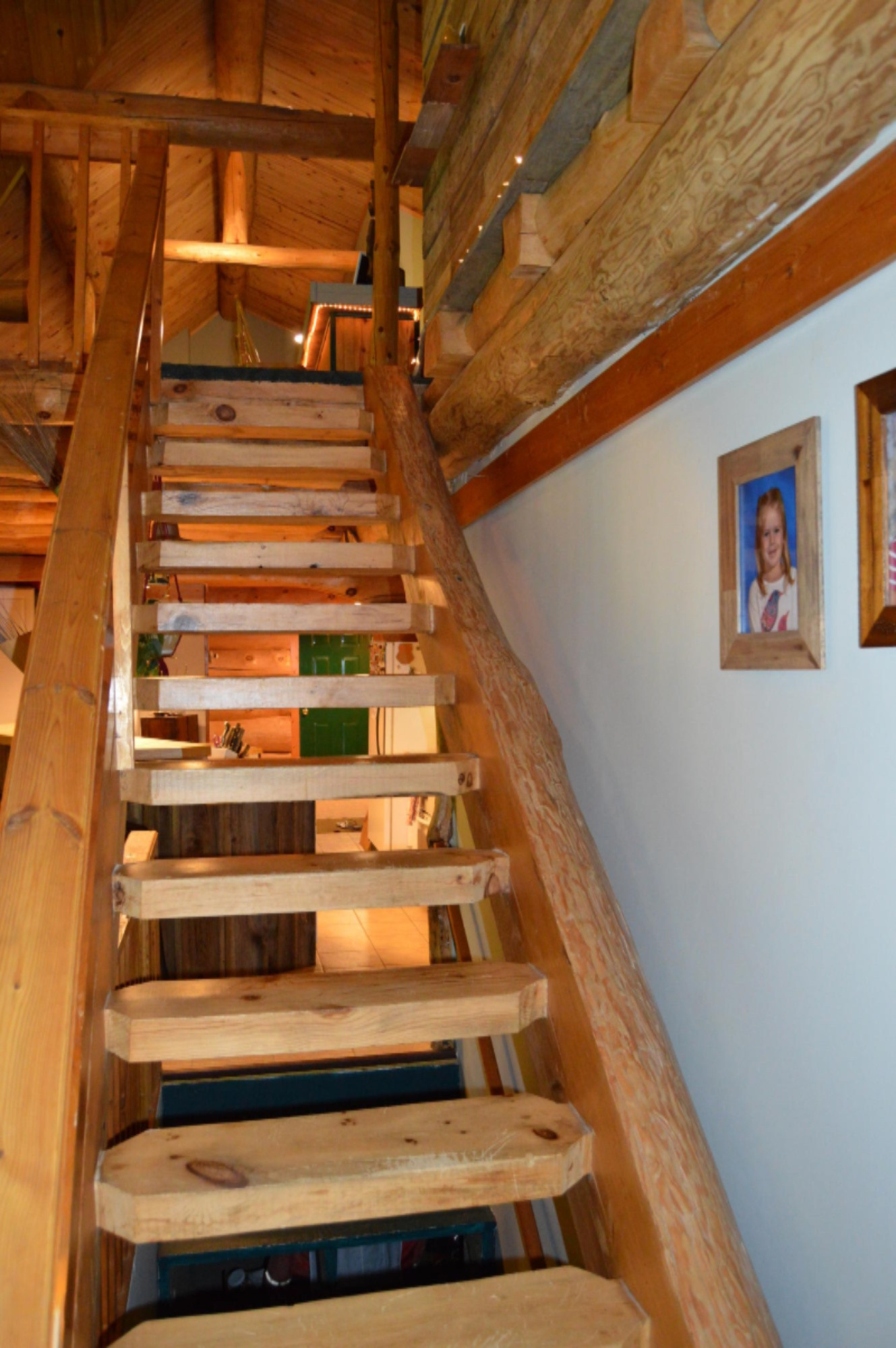 3103 West Hazel Road Hart, MI 49420 - Photo 28 of 47 Log Staircase