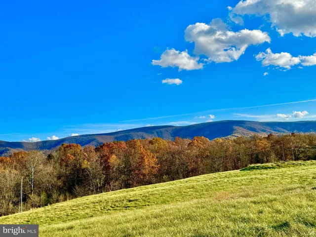 a view of lake and mountain