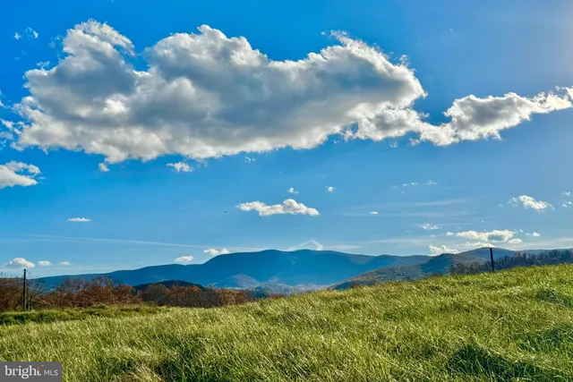a view of an outdoor space and mountain view