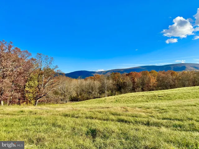 a view of an outdoor space and mountain view