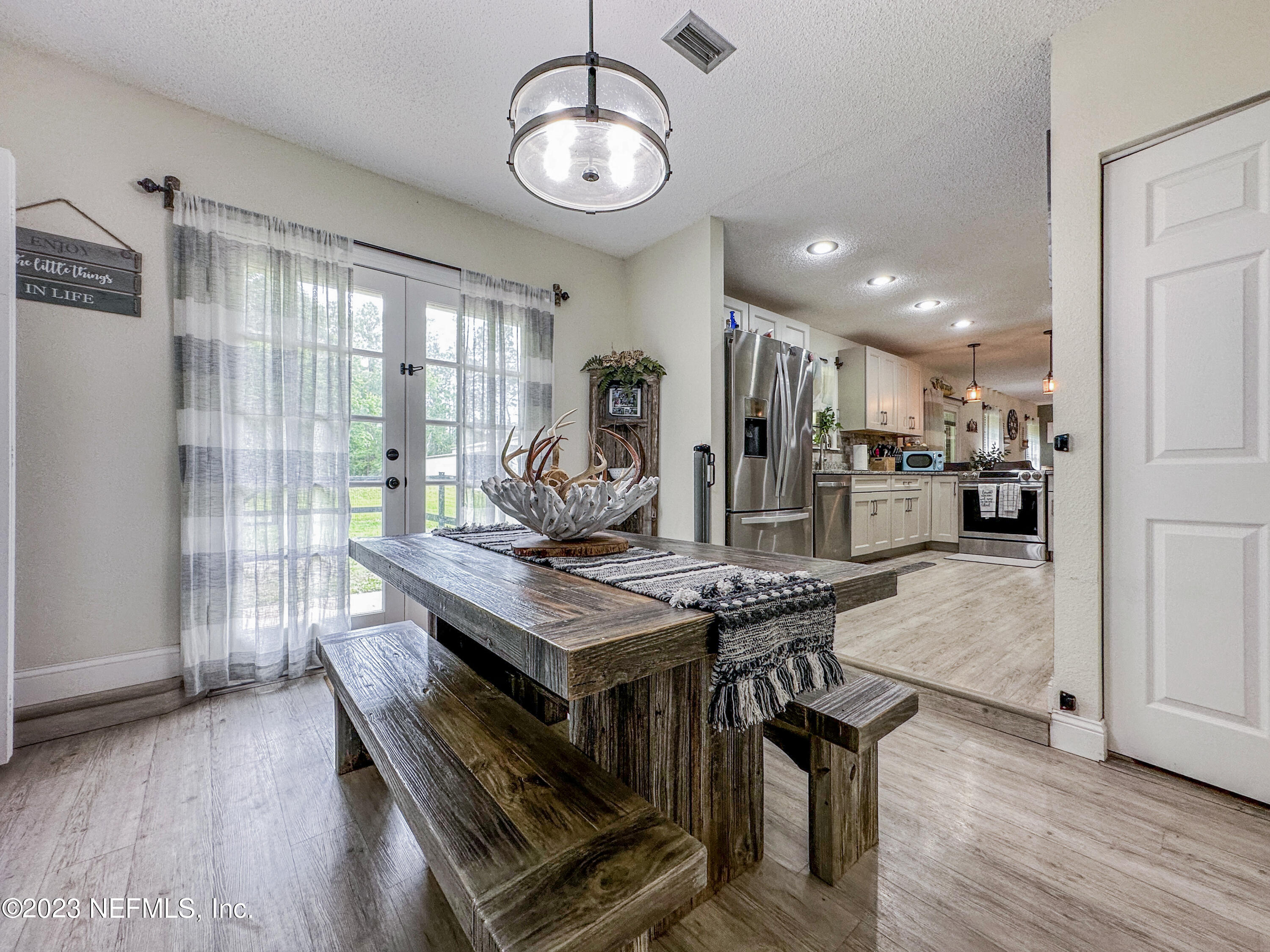 1645 Lightsey Road St. Augustine, FL 32084 - Photo 19 of 40 Dining room with french doors view from