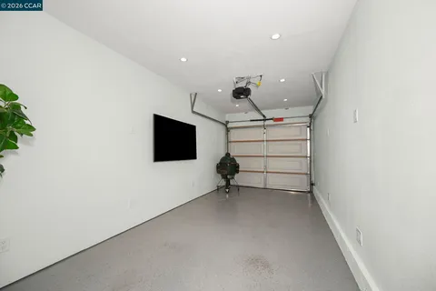 a view of a livingroom with a flat screen tv