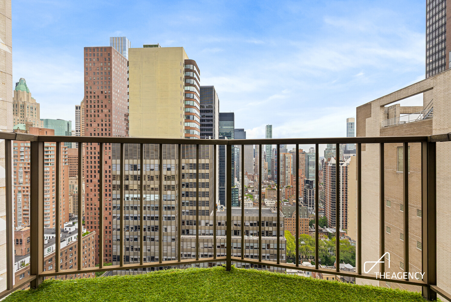212 East 47th Street, Unit 34C Manhattan, NY 10017 - Photo 7 of 9 a view of a balcony with yard