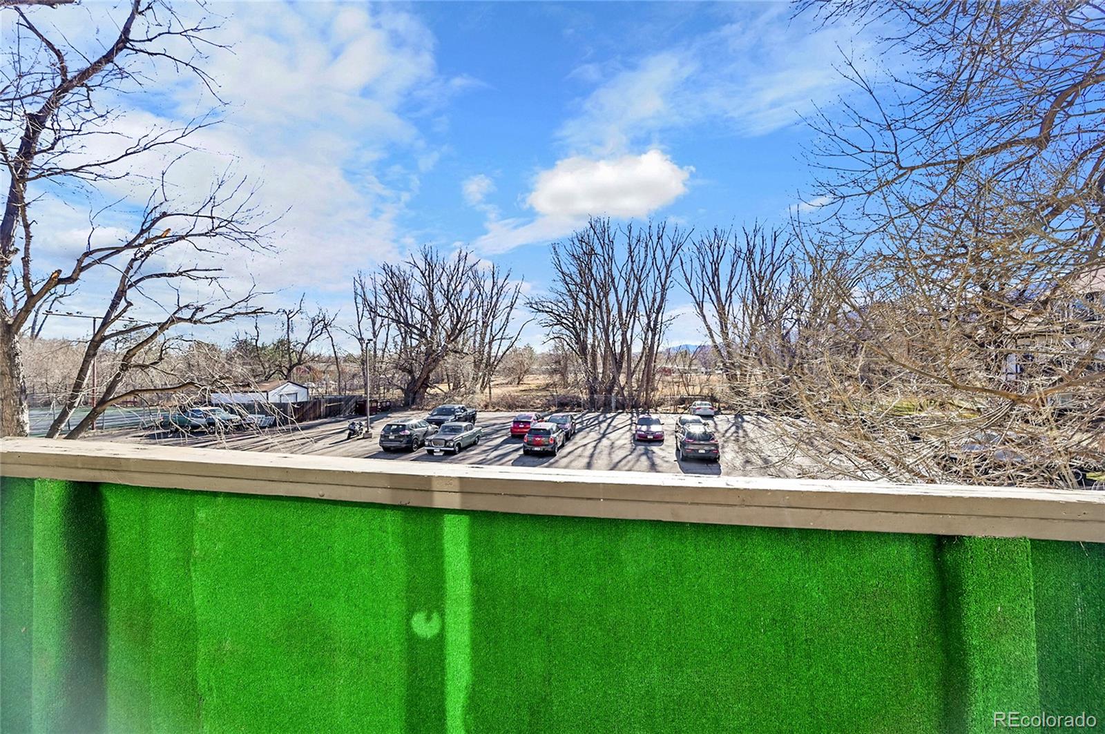 3250 Oneal Circle, Unit 25J Boulder, CO 80301 - Photo 13 of 22 a view of yard with grass and trees