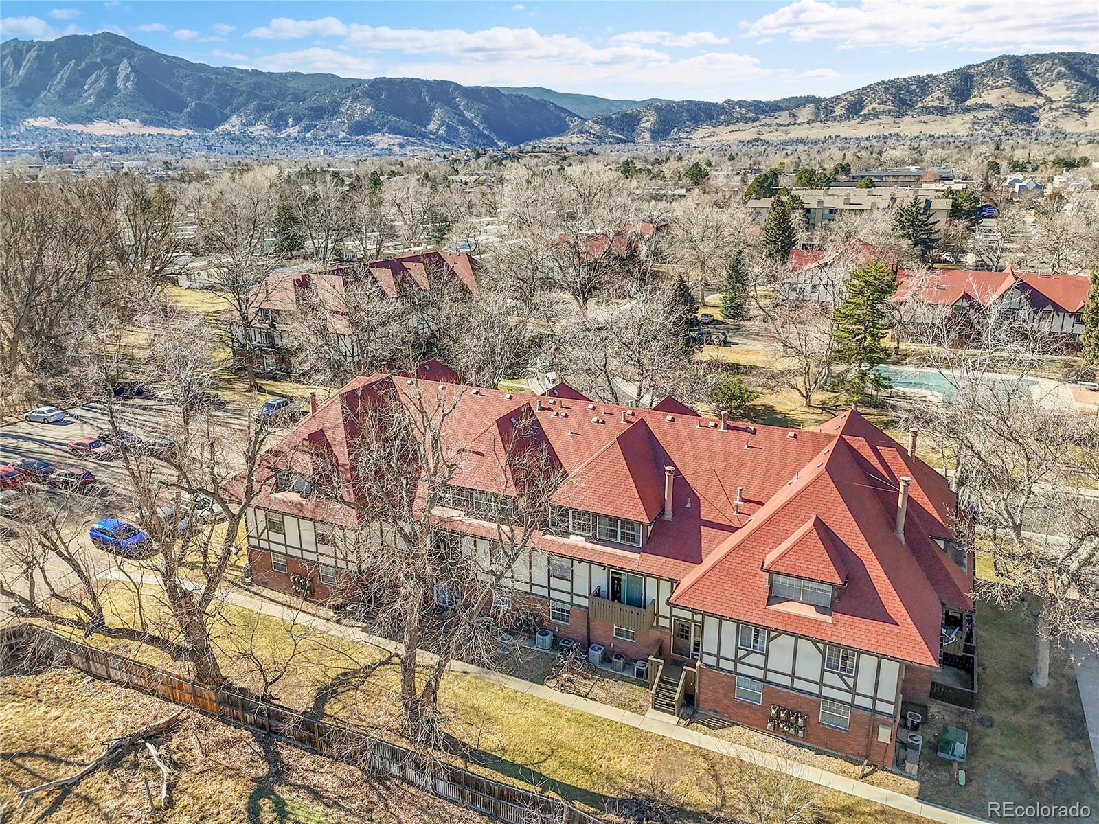 3250 Oneal Circle, Unit 25J Boulder, CO 80301 - Photo 19 of 22 an aerial view of residential house and car parked
