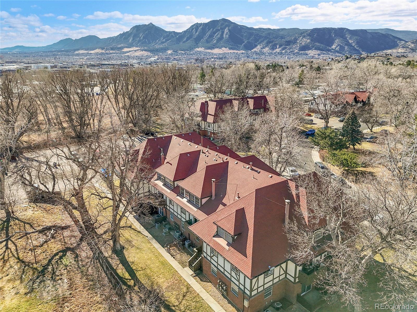 3250 Oneal Circle, Unit 25J Boulder, CO 80301 - Photo 20 of 22 a view of a house with a lake