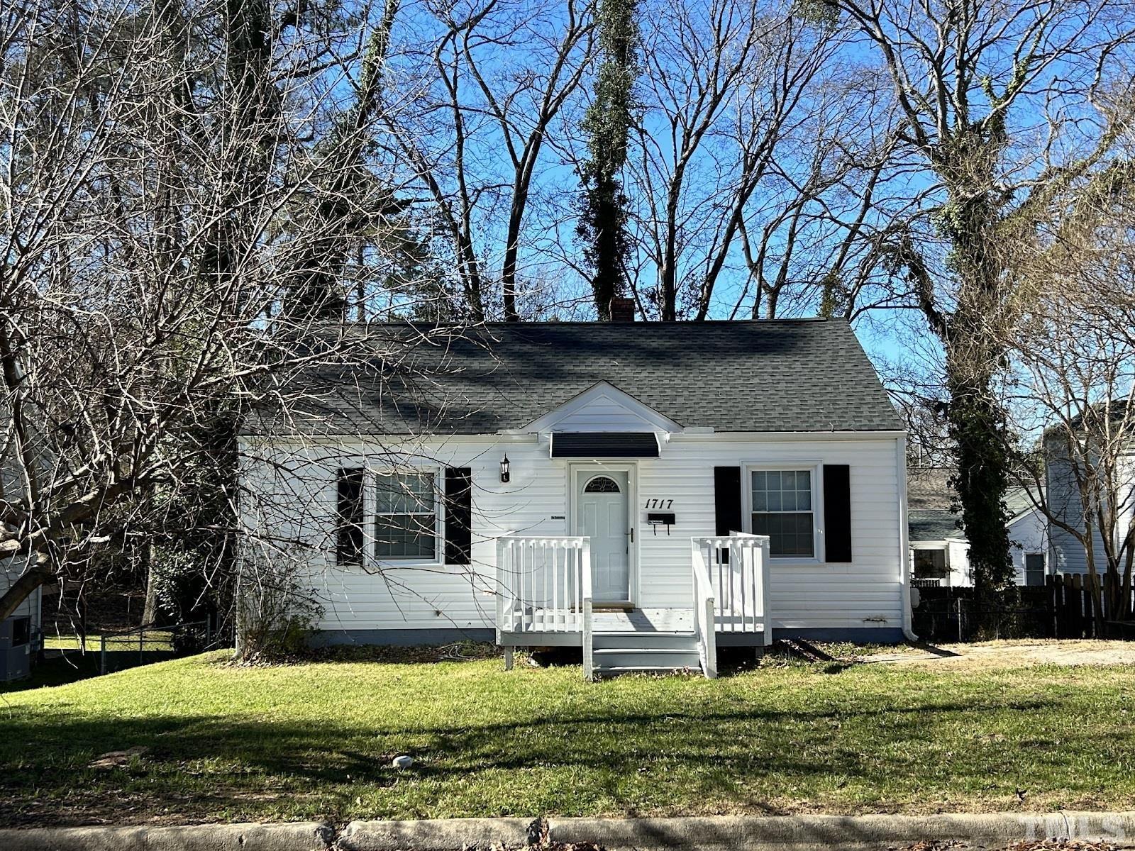 1717 Bennett Street Raleigh, NC 27604 - Photo 1 of 15 a front view of a house with a yard