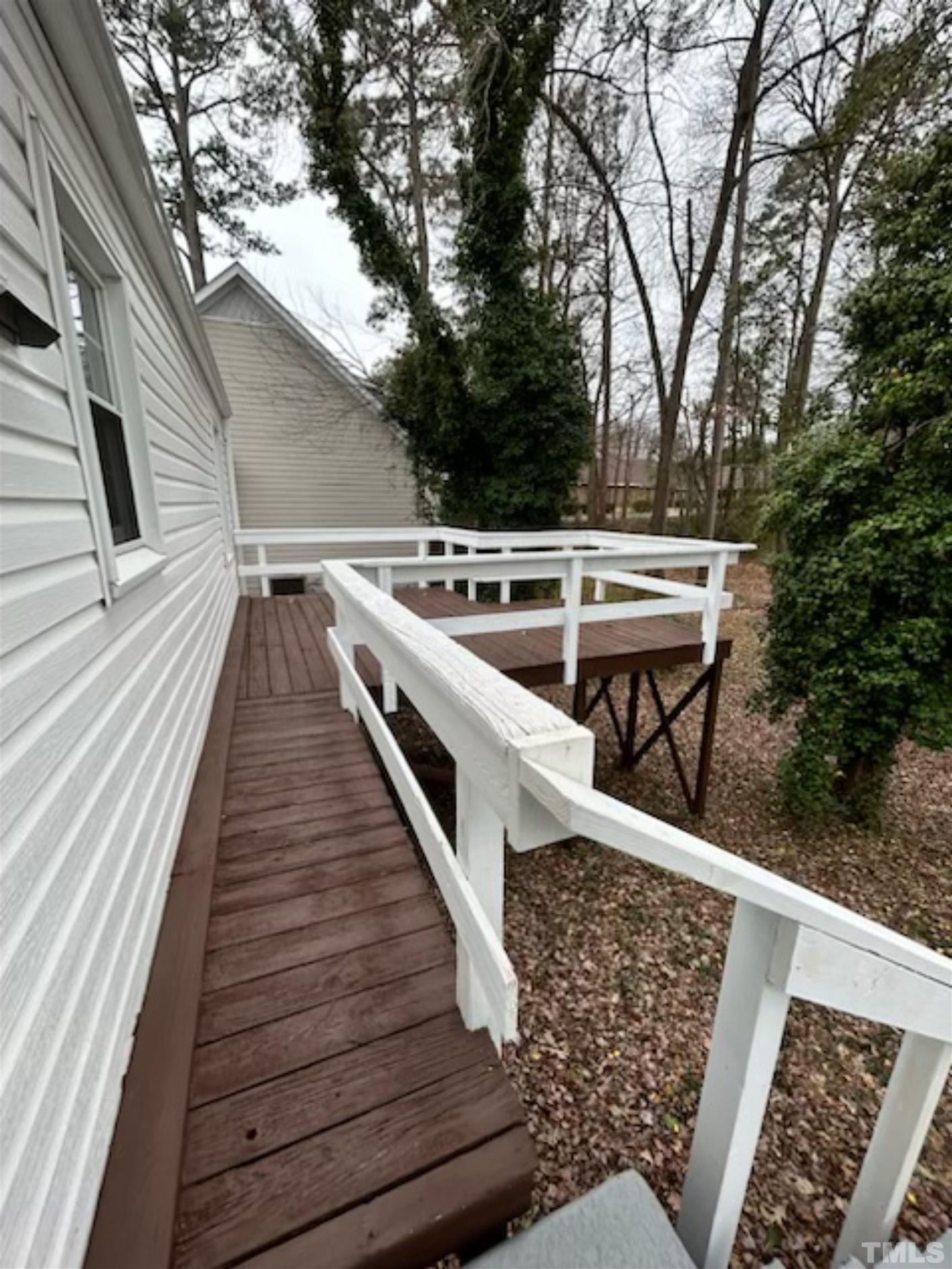 1717 Bennett Street Raleigh, NC 27604 - Photo 13 of 15 a view of balcony with wooden floor and seating space