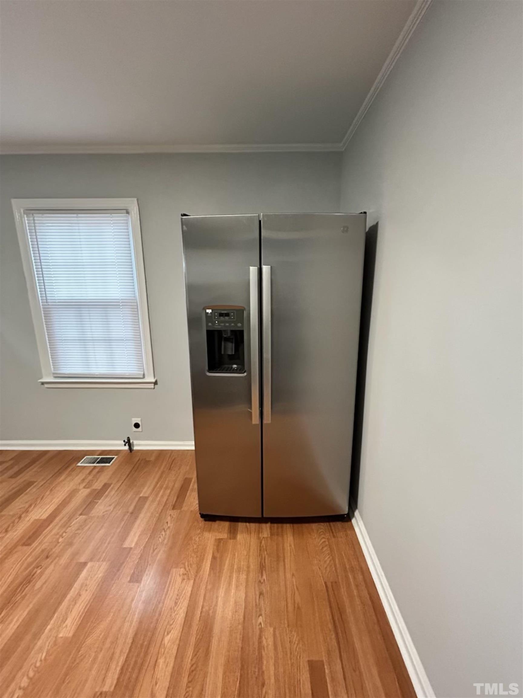 1717 Bennett Street Raleigh, NC 27604 - Photo 9 of 15 a view of empty room with wooden floor