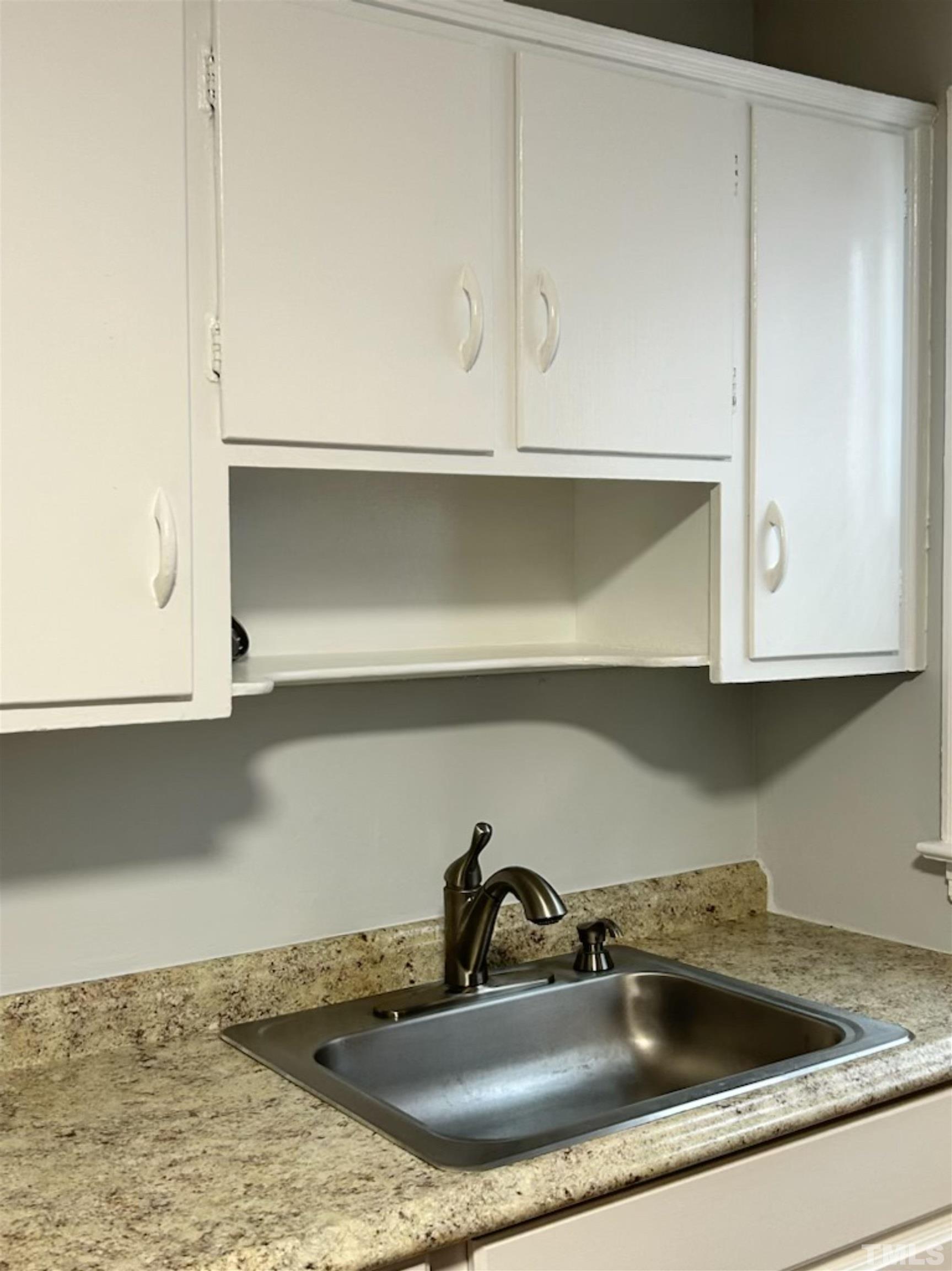 1717 Bennett Street Raleigh, NC 27604 - Photo 10 of 15 a close view of sink and tap