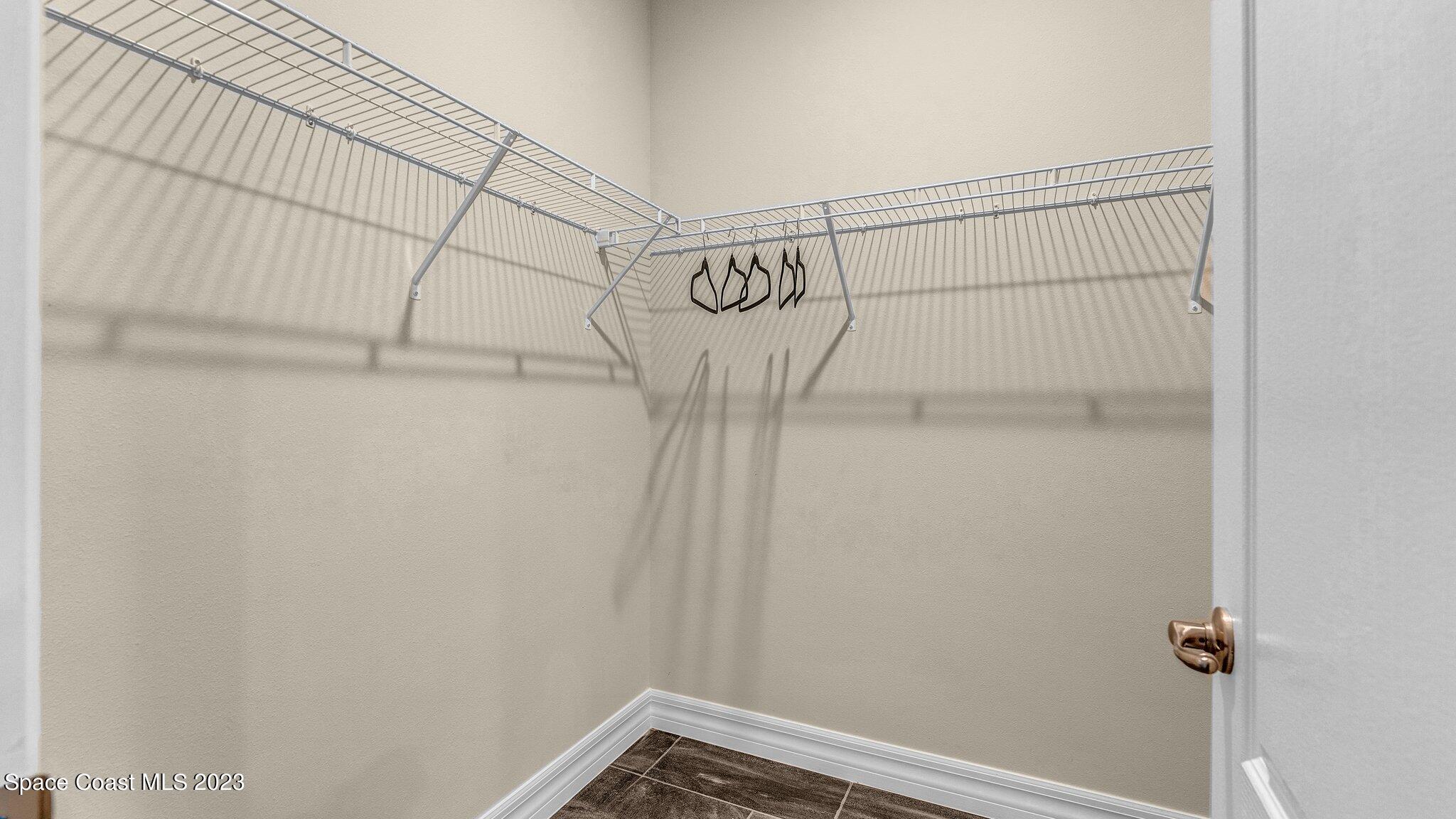 491 Tilhal Road Southwest Palm Bay, FL 32908 - Photo 21 of 30 a view of a rack on the wall