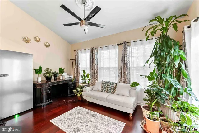 a large kitchen with stainless steel appliances granite countertop a stove and a sink
