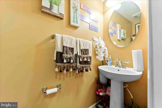 a bedroom with furniture and a large window