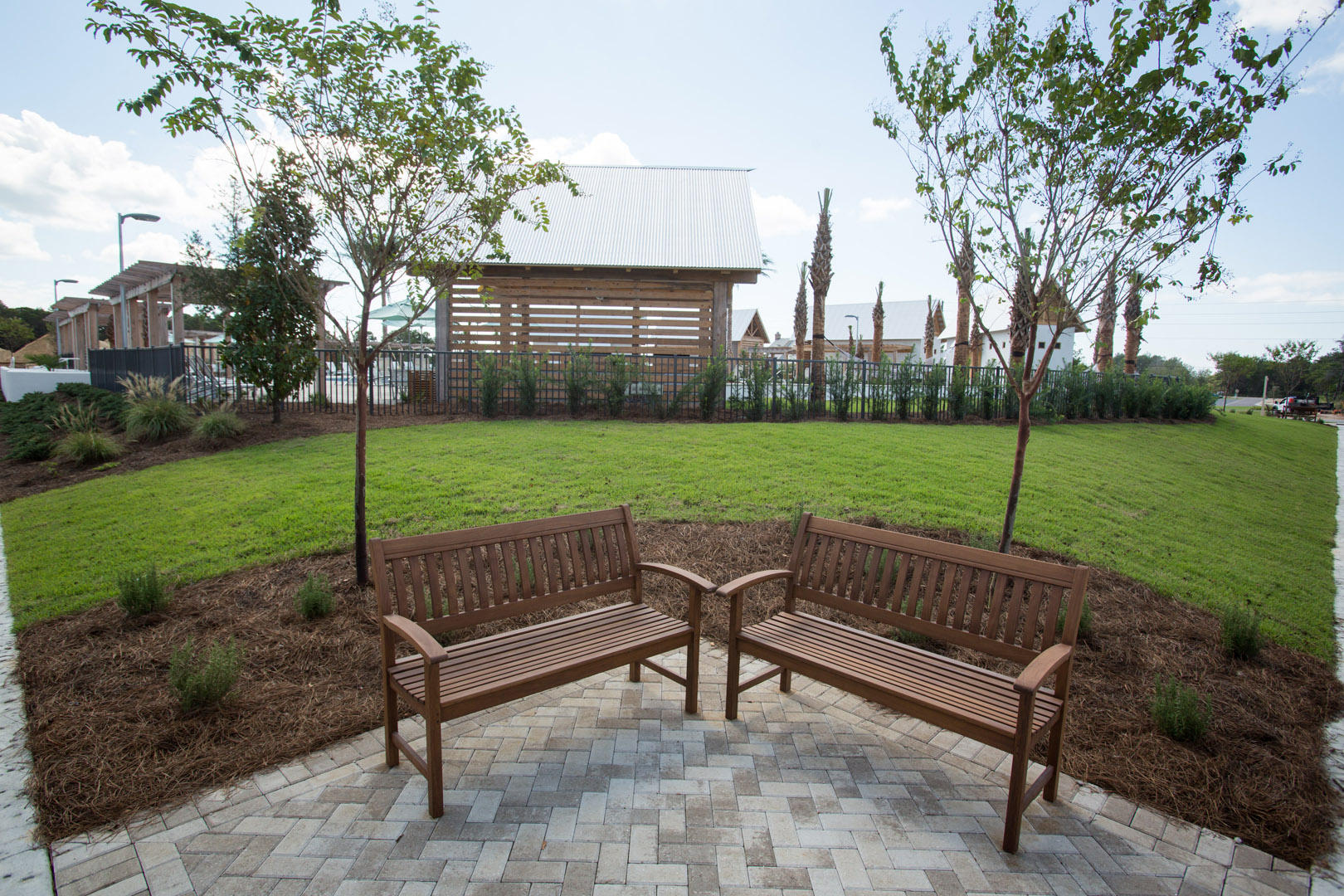 75 York Lane, Unit 245 Inlet Beach, FL 32461 - Photo 36 of 41 a view of a bench in a yard