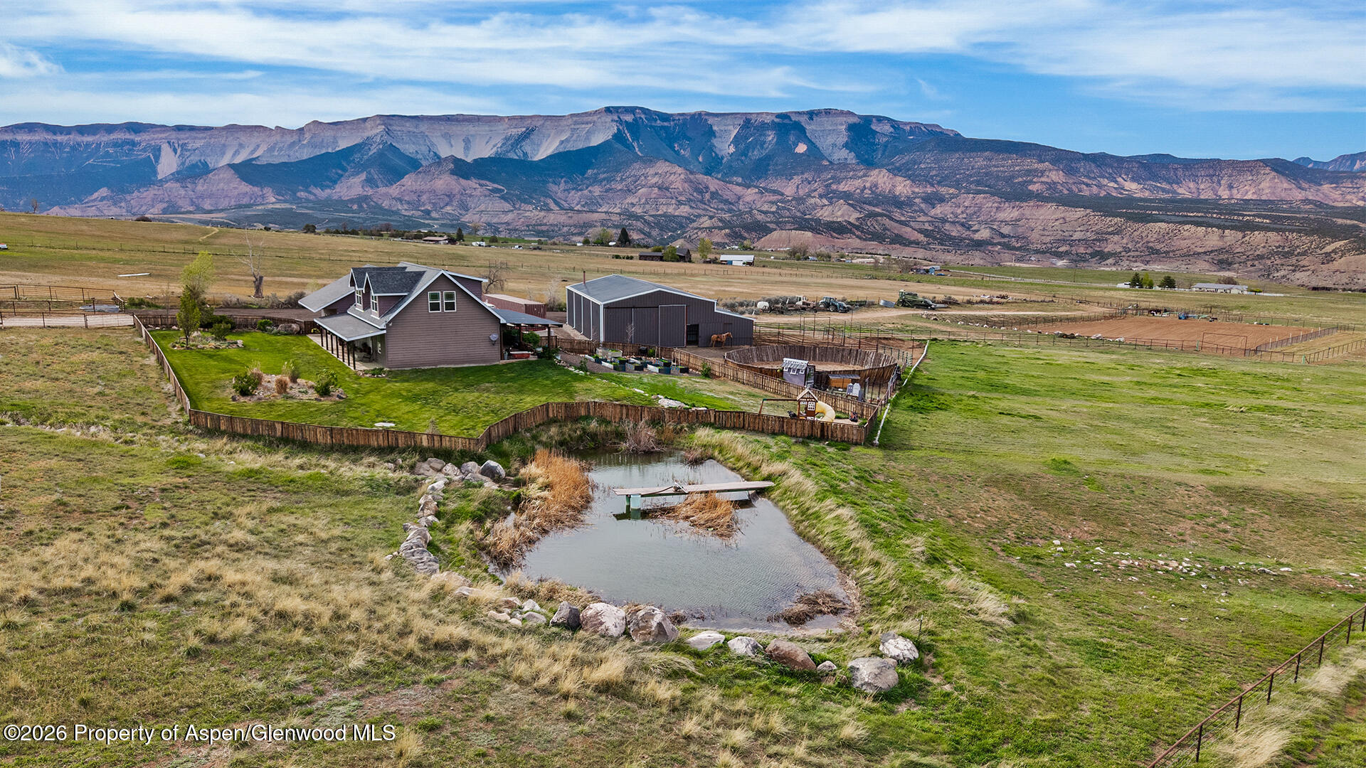 8877 County Road 320 Rifle, CO 81650 - Photo 1 of 51 a view of a lake with a mountain
