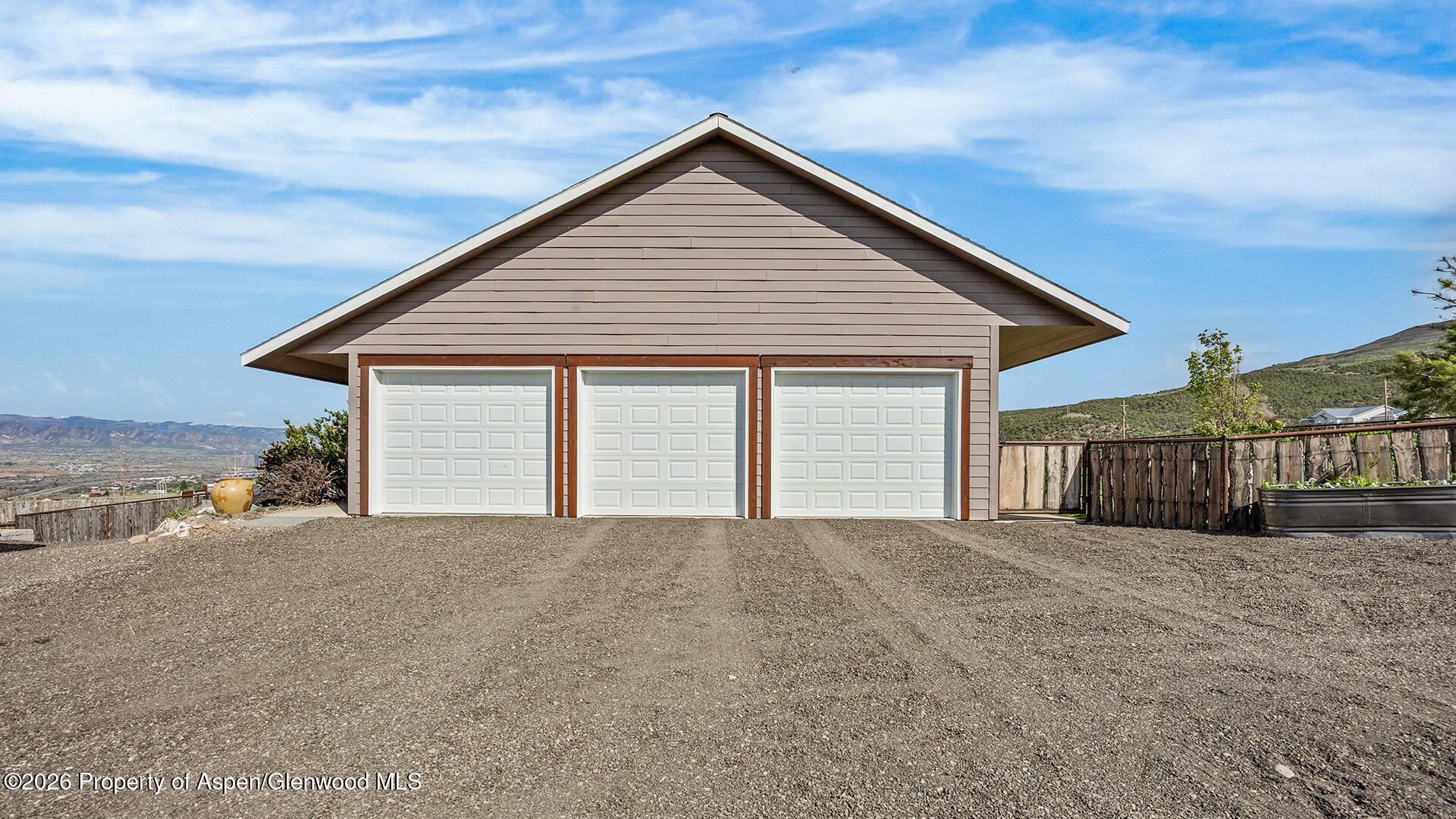 8877 County Road 320 Rifle, CO 81650 - Photo 19 of 51 a view of a house with a yard