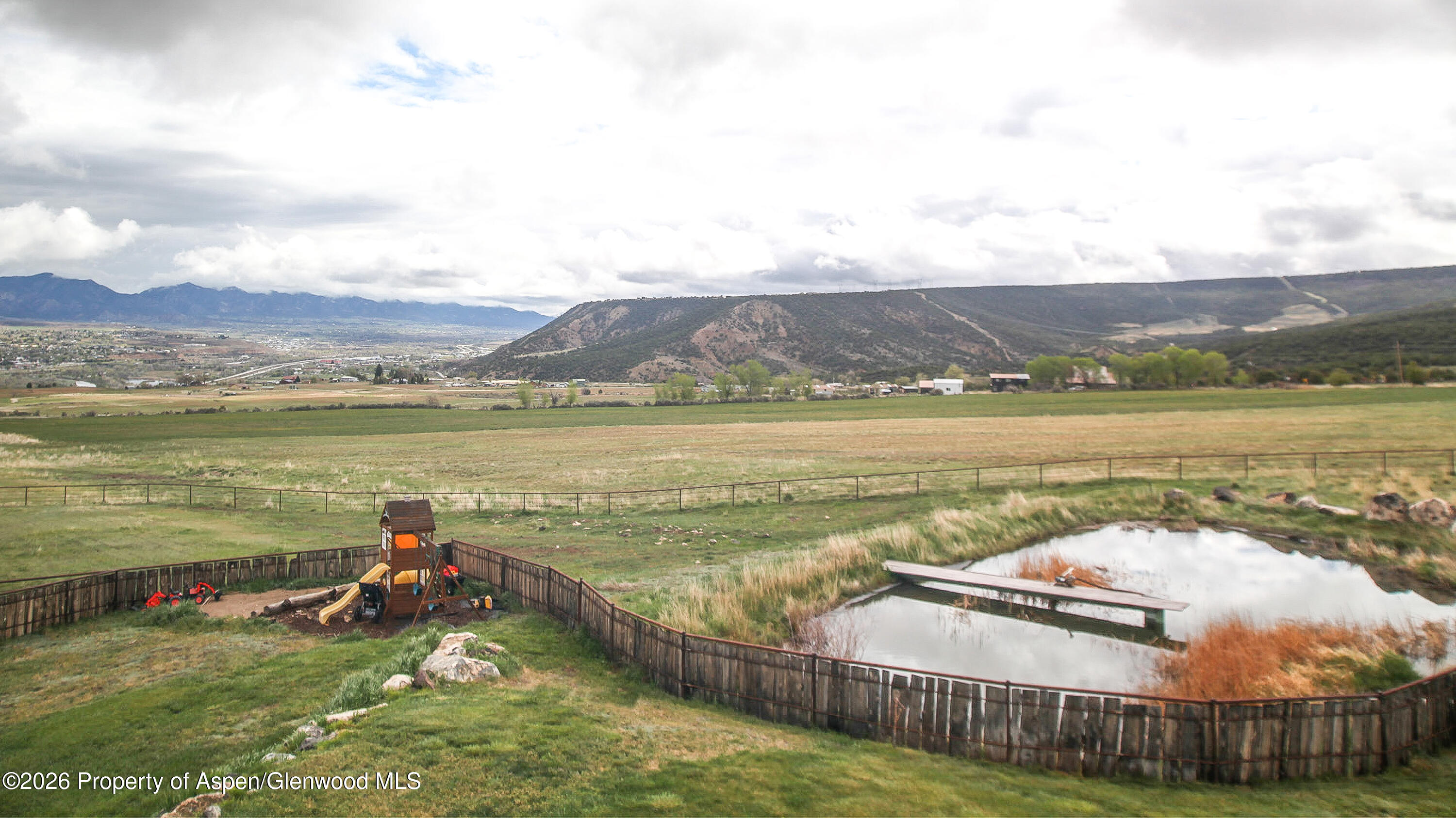 8877 County Road 320 Rifle, CO 81650 - Photo 26 of 51 a view of a lake with a mountain