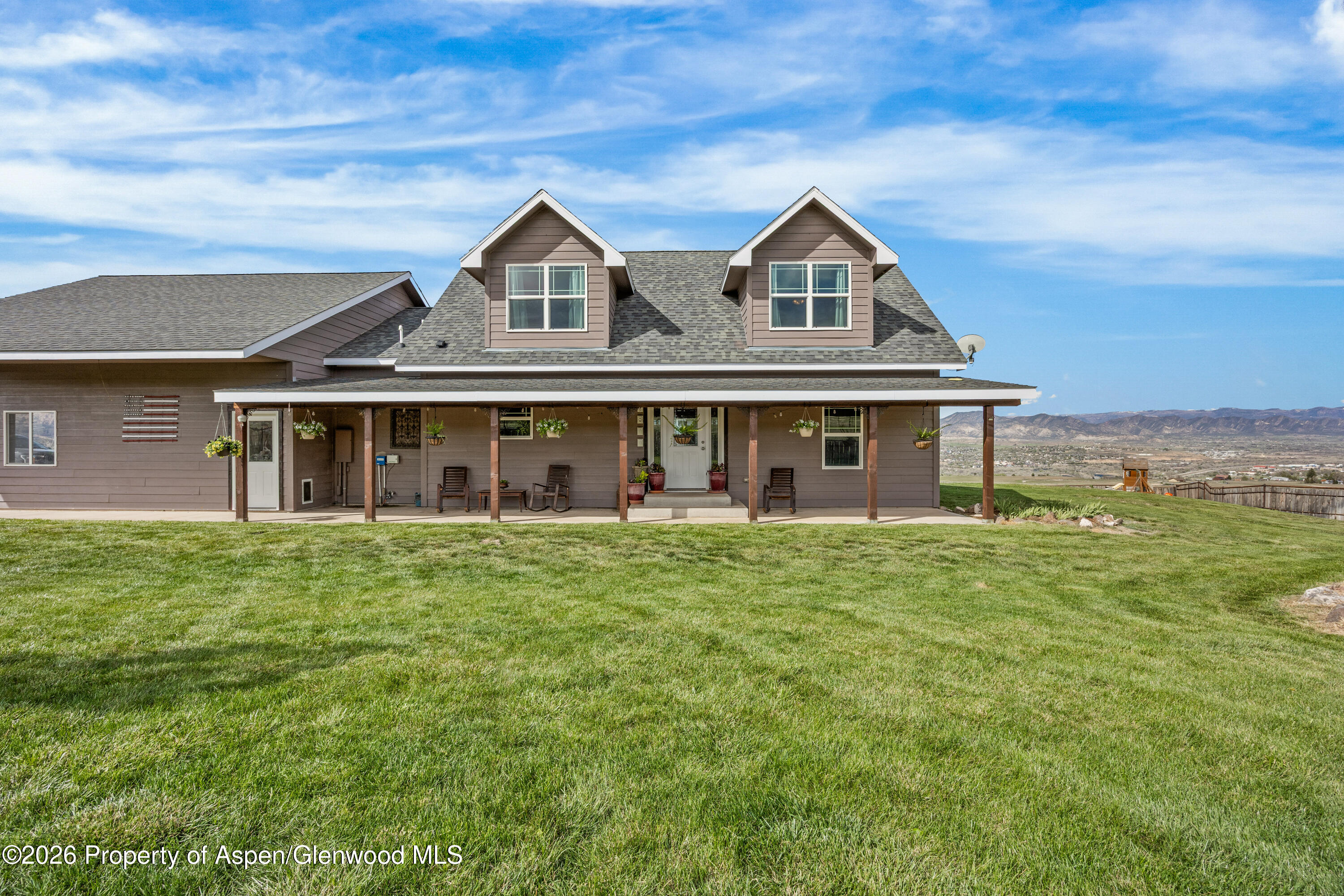8877 County Road 320 Rifle, CO 81650 - Photo 29 of 51 front view of a house with a garden