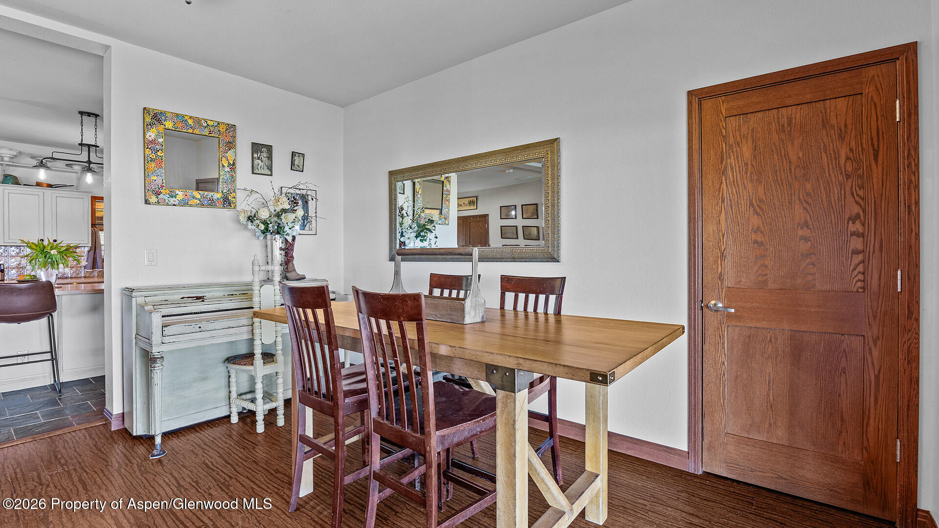 8877 County Road 320 Rifle, CO 81650 - Photo 37 of 51 a view of a dining room with furniture and wooden floor