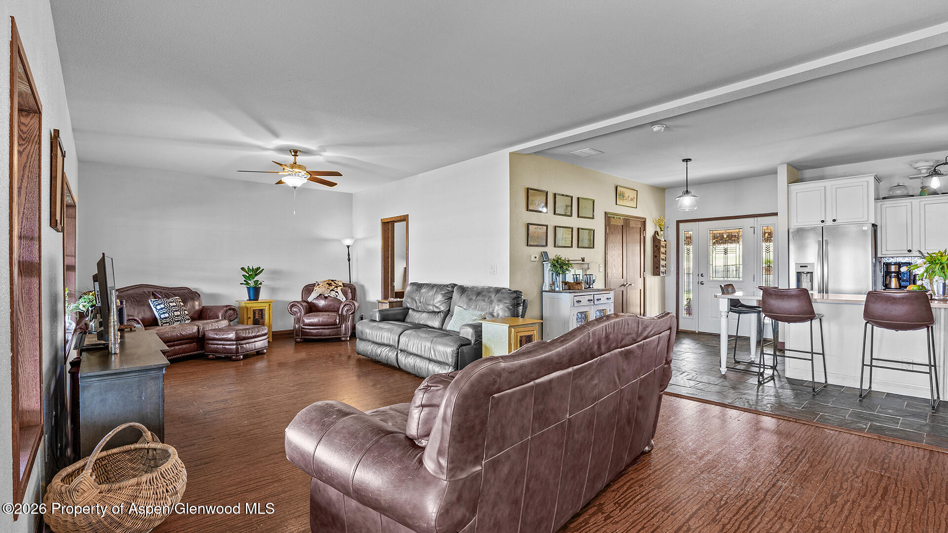 8877 County Road 320 Rifle, CO 81650 - Photo 38 of 51 a living room with furniture and wooden floor