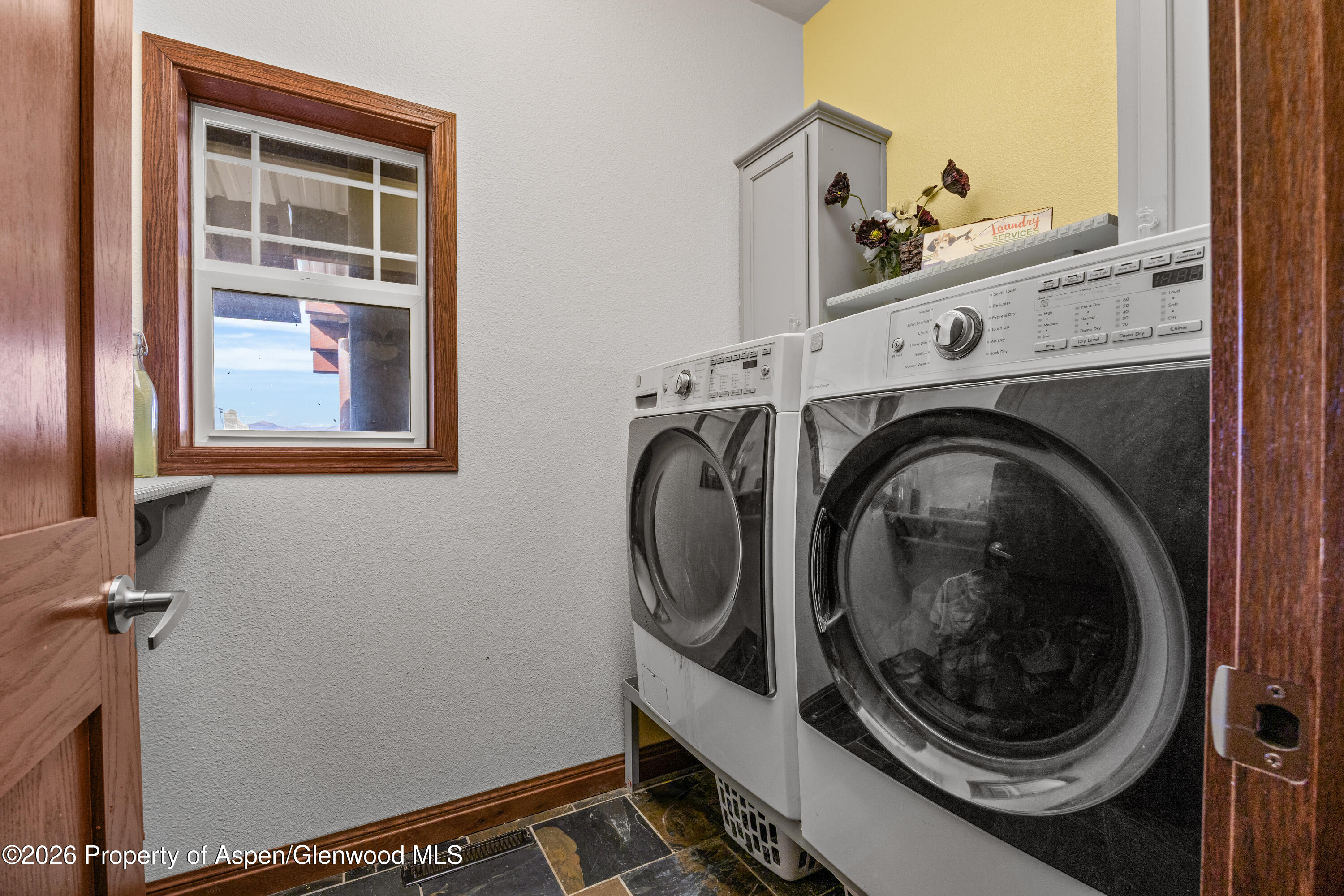 8877 County Road 320 Rifle, CO 81650 - Photo 48 of 51 a utility room with dryer and washer