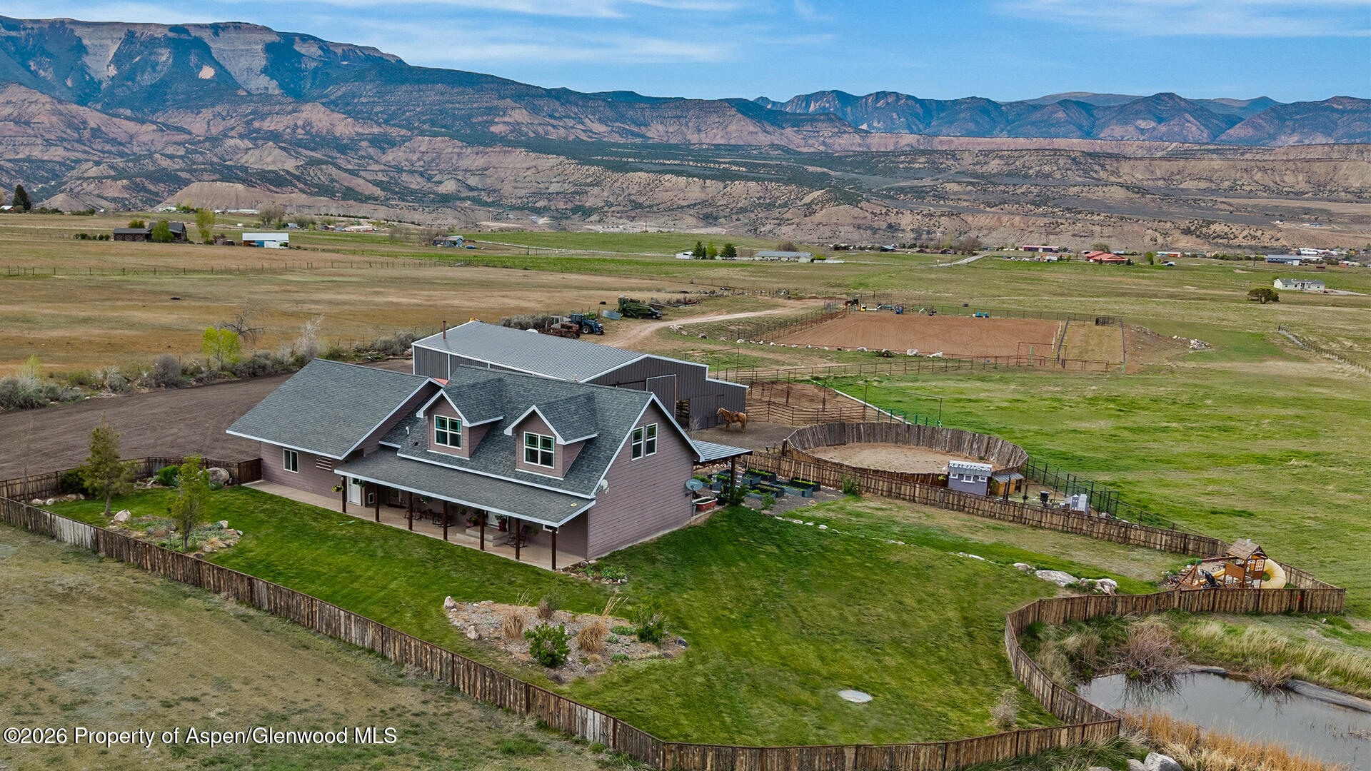 8877 County Road 320 Rifle, CO 81650 - Photo 7 of 51 an aerial view of a house with big yard