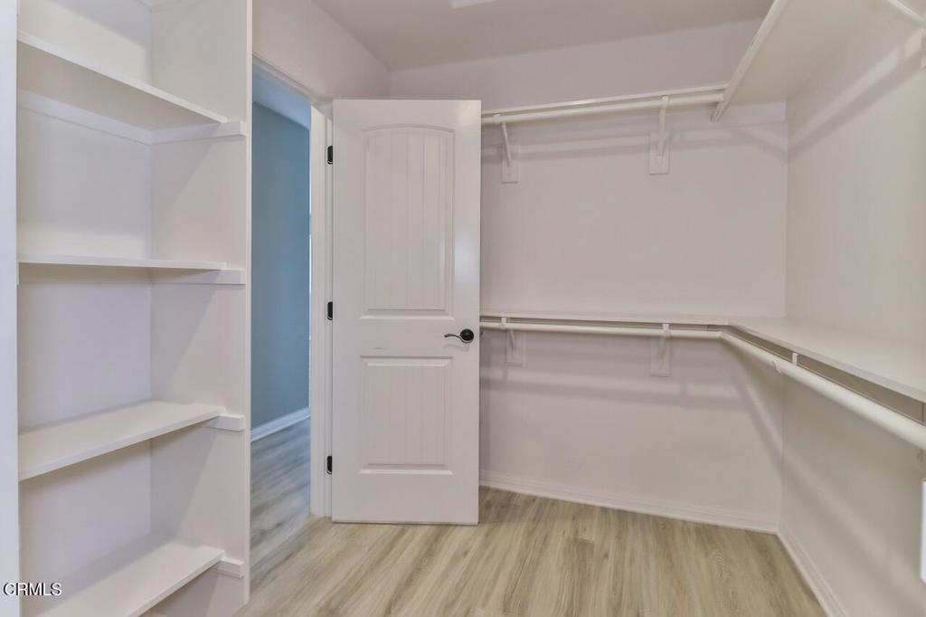 1030 Canal Street Oxnard, CA 93035 - Photo 19 of 26 a view of walk in closet with empty racks