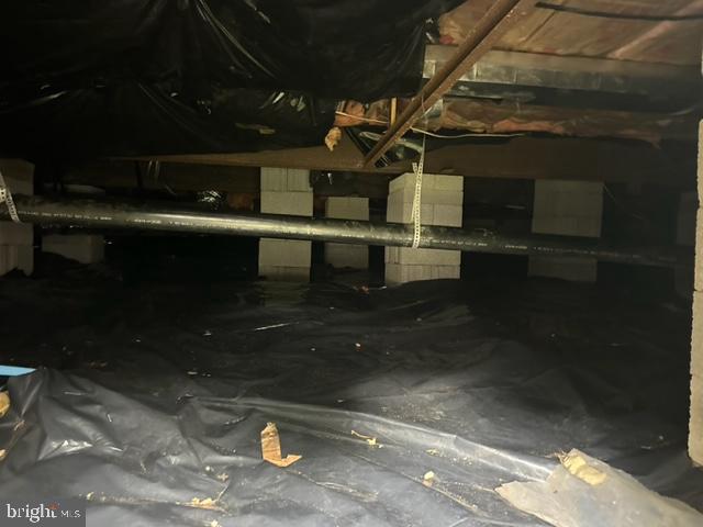 4065 Chalklevel Road Louisa, VA 23093 - Photo 18 of 21 Crawl space w/ new insulation and plastic