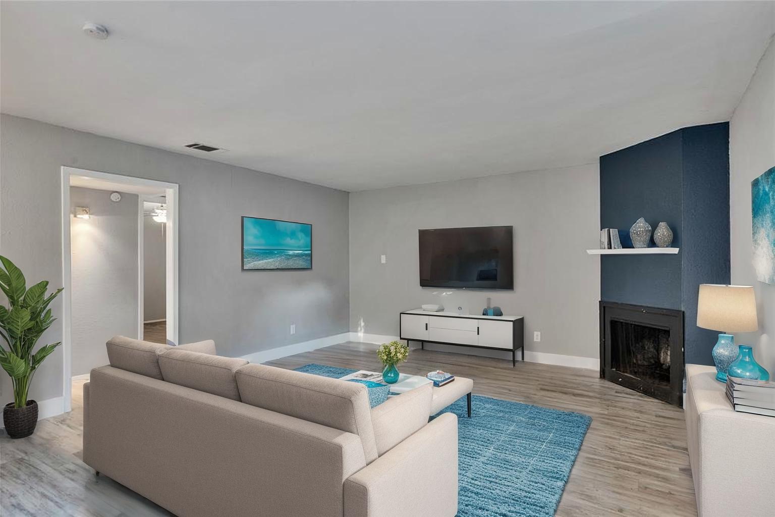 4721 Blueberry Trail, Unit A Austin, TX 78723 - Photo 1 of 1 a living room with furniture and a flat screen tv