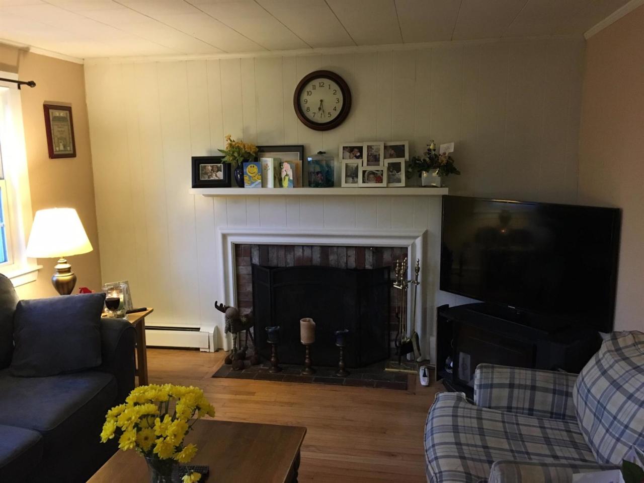30 Skating Rink Road Hyannis, MA 02601 - Photo 5 of 10 a living room with furniture and a fireplace