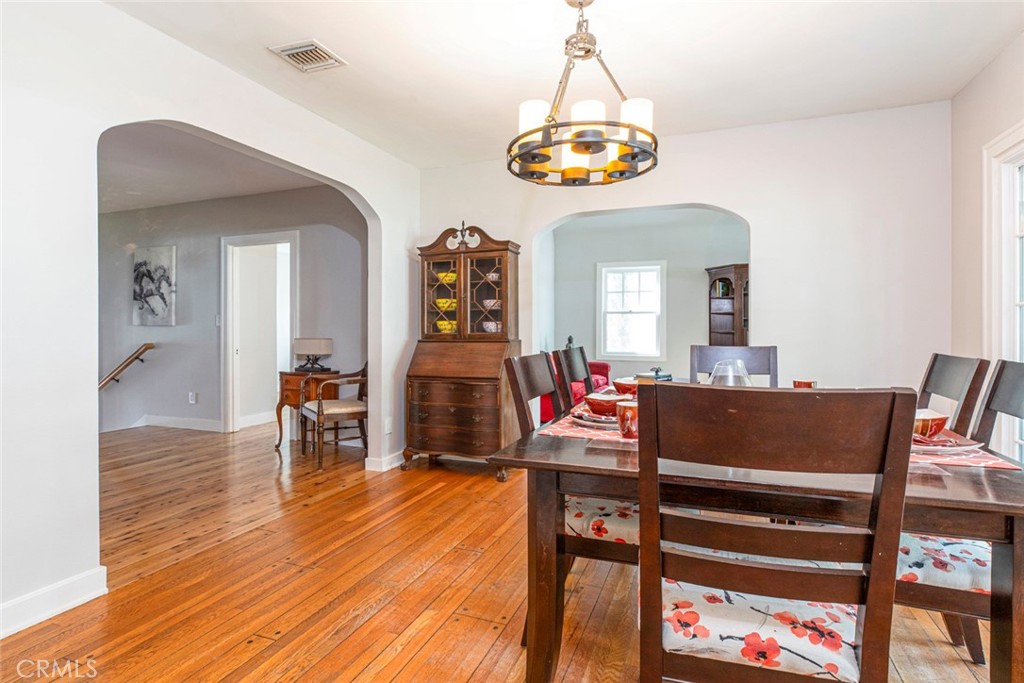 1748 Bel Aire Drive Glendale, CA 91201 - Photo 12 of 51 a view of a dining room with furniture and chandelier