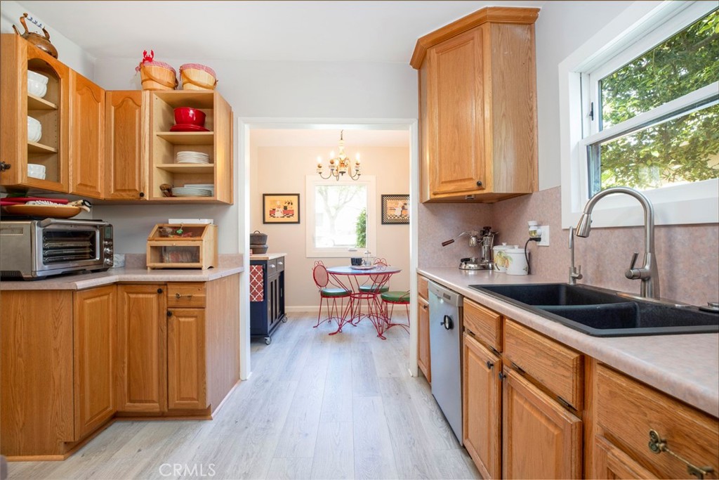 1748 Bel Aire Drive Glendale, CA 91201 - Photo 16 of 51 a kitchen with a sink stove top oven and cabinets
