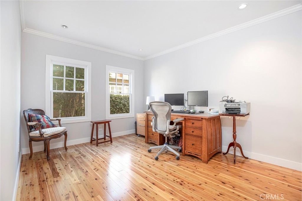 1748 Bel Aire Drive Glendale, CA 91201 - Photo 19 of 51 a work room with furniture and wooden floor