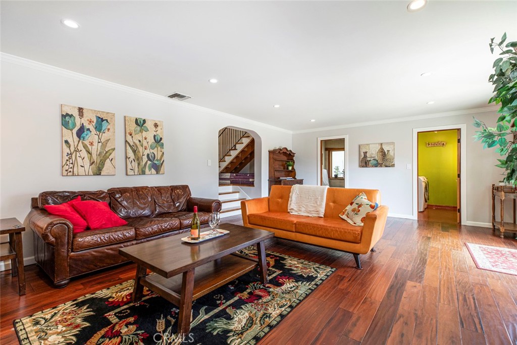 1748 Bel Aire Drive Glendale, CA 91201 - Photo 29 of 51 a living room with furniture and wooden floor