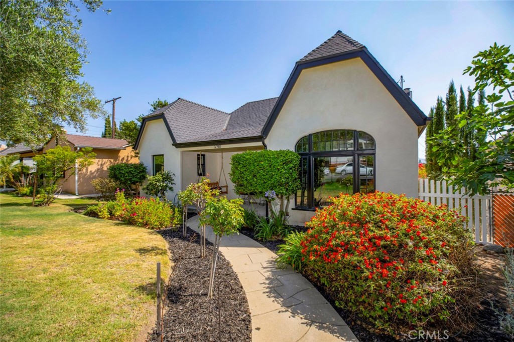 1748 Bel Aire Drive Glendale, CA 91201 - Photo 3 of 51 a front view of a house with garden