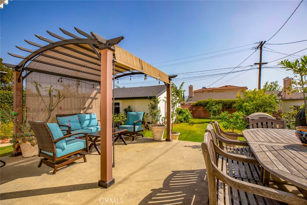 1748 Bel Aire Drive Glendale, CA 91201 - Photo 40 of 51 a view of a patio with a table and chairs