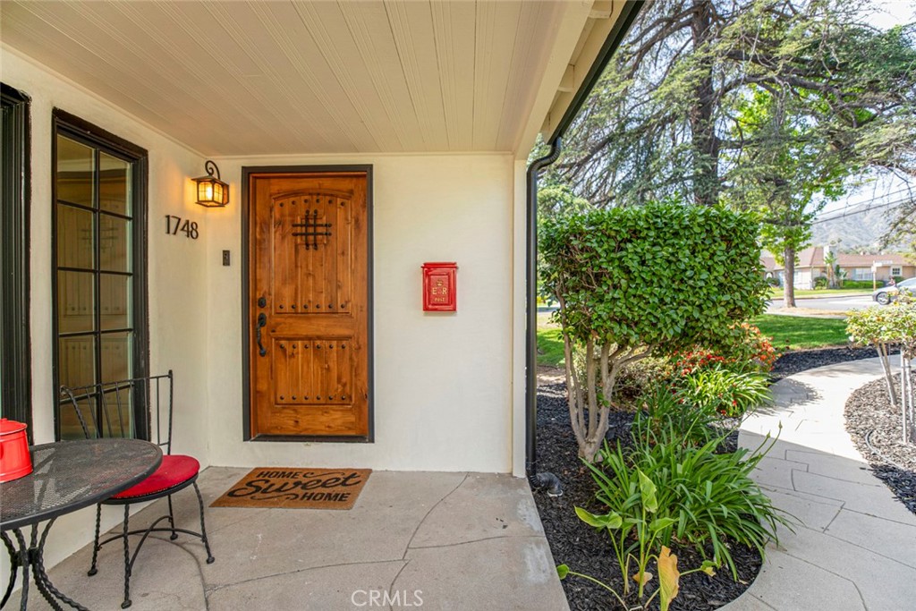 1748 Bel Aire Drive Glendale, CA 91201 - Photo 5 of 51 a house with potted plants in front of it